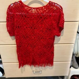 Red crocheted fringe top.